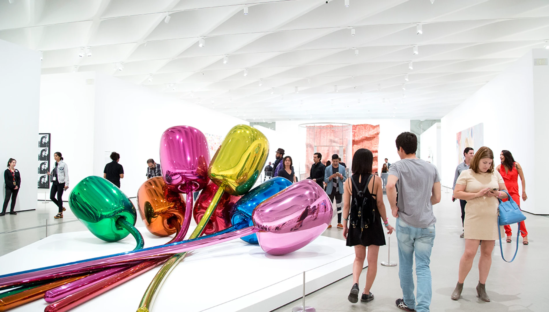 Busy third floor galleries featuring Jeff Koon's Tulips sculptures